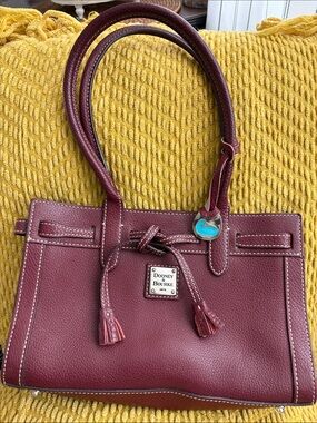 Dooney & Bourke Burgundy Pebbled Leather Satchel with Tassel